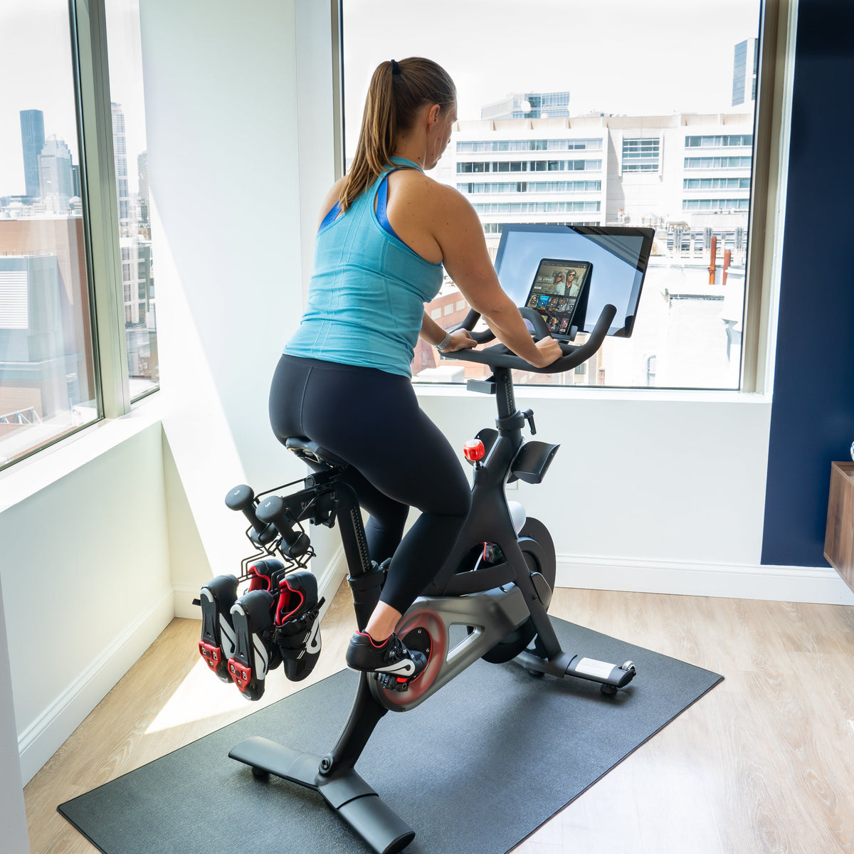 Rider on a Peloton bike that powers on