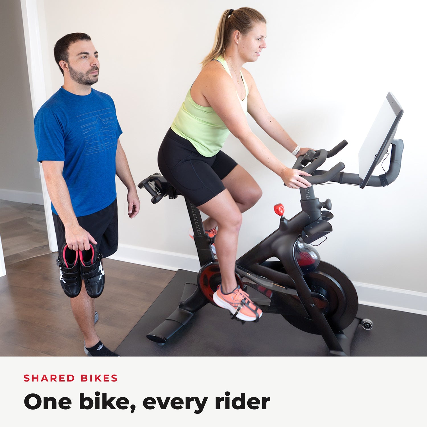 Couple sharing one Peloton bike, one in sneakers with Toe Cages